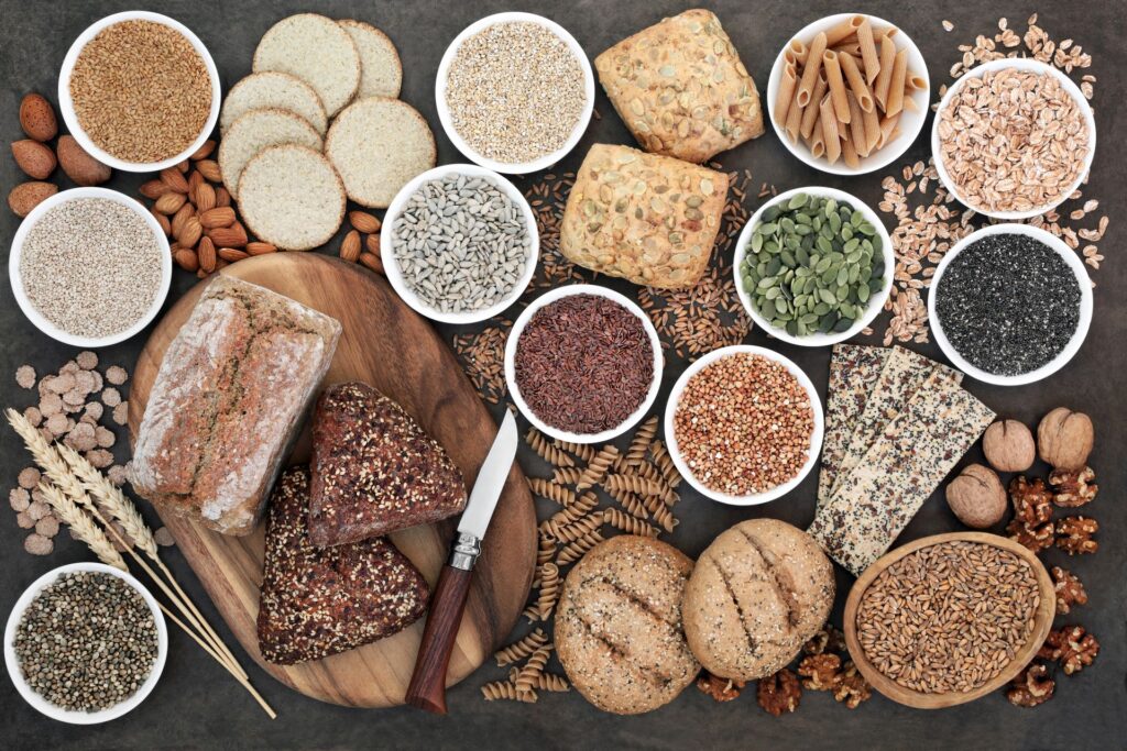 Whole grain bread and rolls, whole wheat pasta, grains, nuts, seeds, oatmeal, oats, crackers, barley and bran flakes.